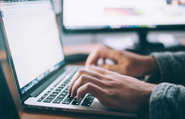typing at a computer